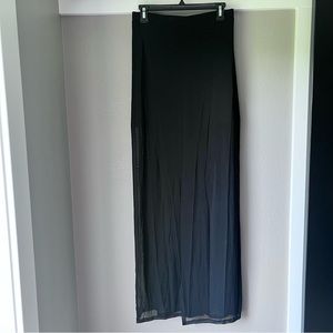 Showpo. Black semi sheer maxi wrap style skirt size 10